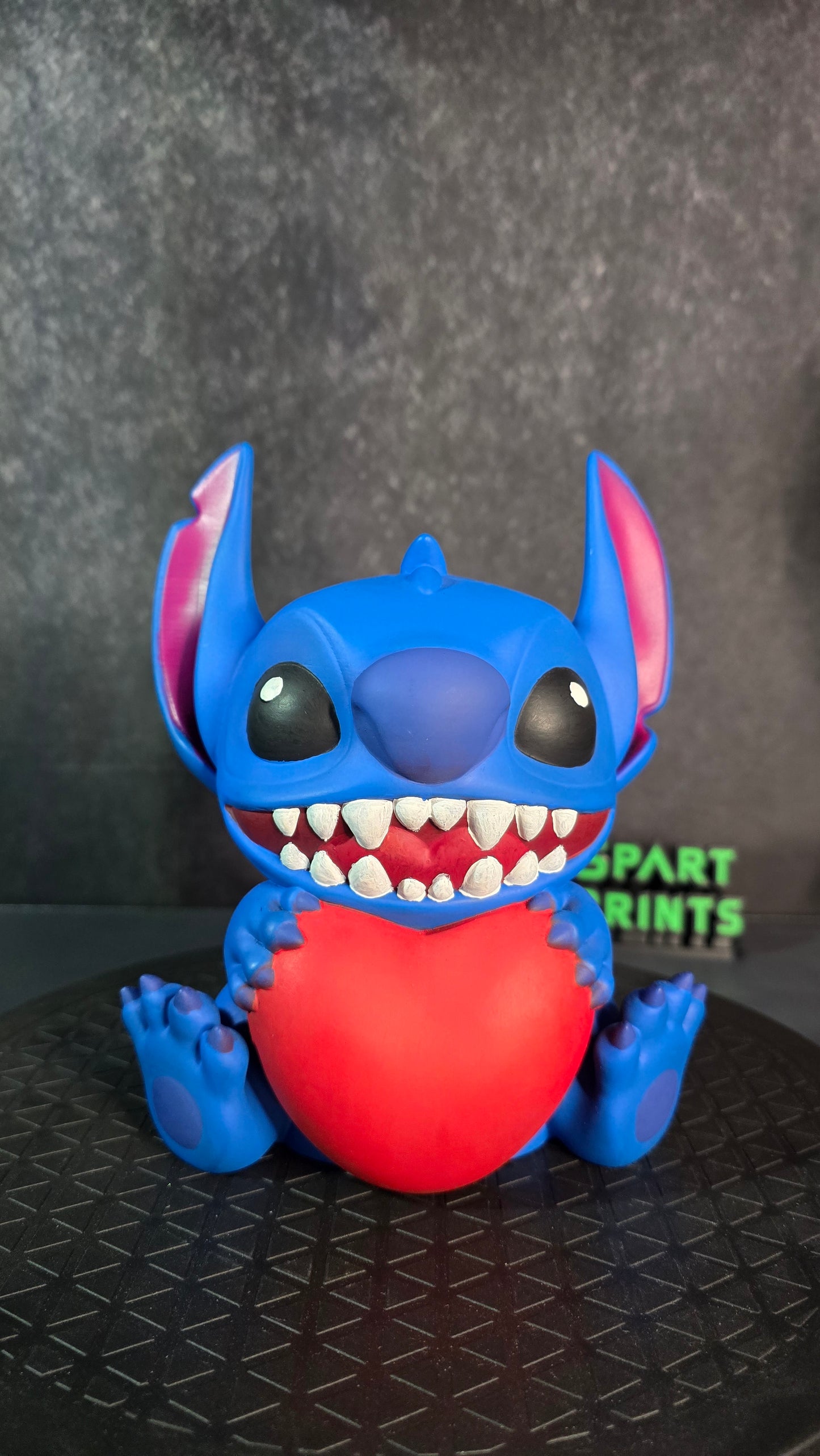 Loving Stitch Holding a Heart